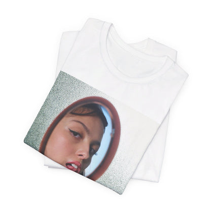 A black graphic t-shirt featuring a Y2K pop aesthetic graphic of Olivia Rodrigo.