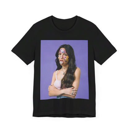A black graphic t-shirt featuring a bold graphic of Olivia Rodrigo as a pop superstar.