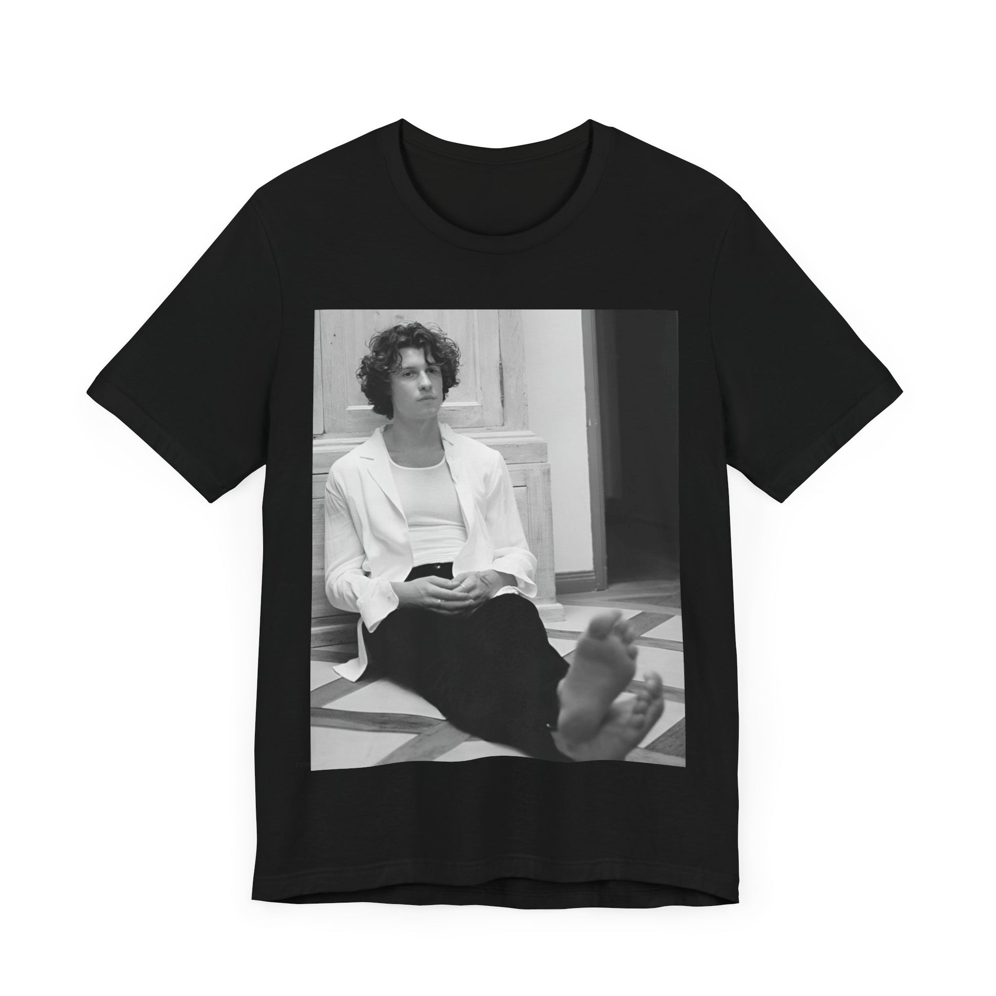 A black graphic t-shirt featuring a vintage casual style graphic of Shawn Mendes.
