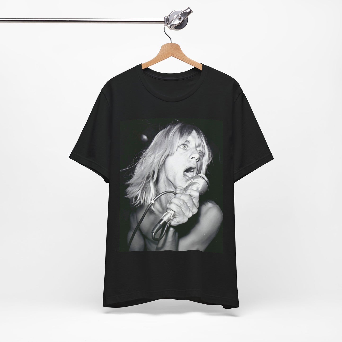 A black graphic t-shirt featuring a graphic of Iggy Pop as the Godfather of Punk, performing live.