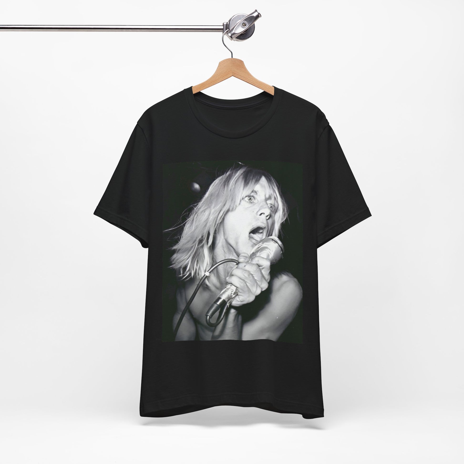 A black graphic t-shirt featuring a graphic of Iggy Pop as the Godfather of Punk, performing live.