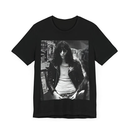 A black graphic t-shirt featuring a 70s black and white photo portrait of Joey Ramone from Ramones.