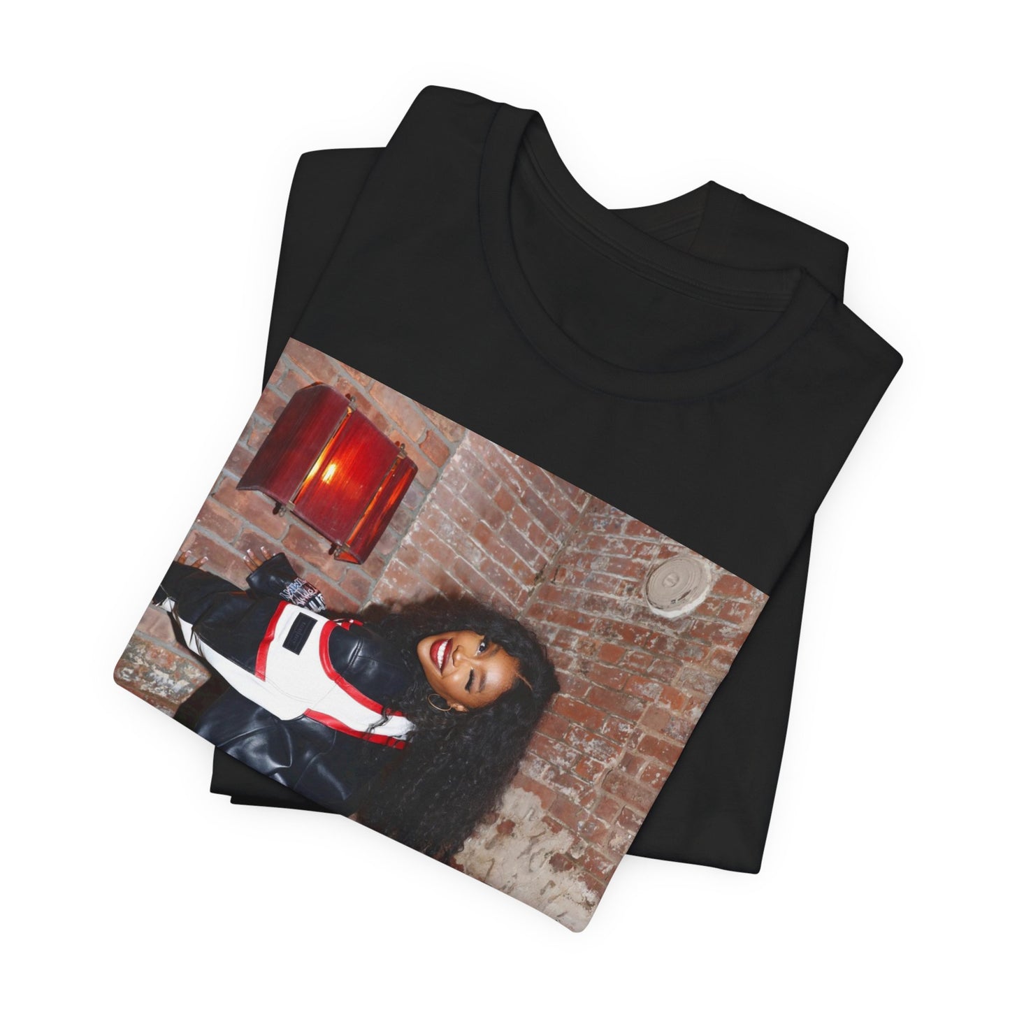 A black graphic t-shirt featuring a graphic of SZA as a TDE Queen R&B icon.