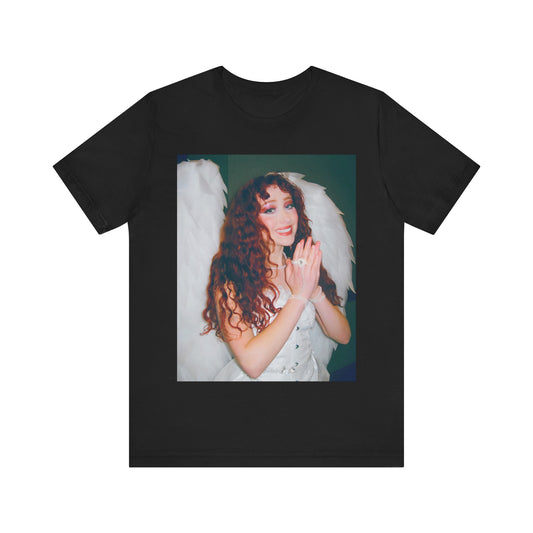 A black graphic t-shirt featuring a graphic of Chappell Roan, possibly with DIY or independent pop elements.