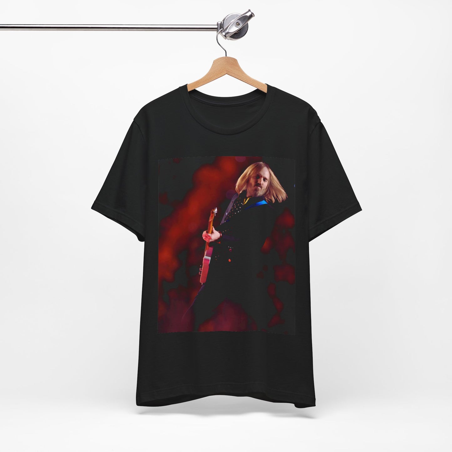 A black graphic t-shirt featuring a graphic or photo of Tom Petty as a powerhouse live performer.