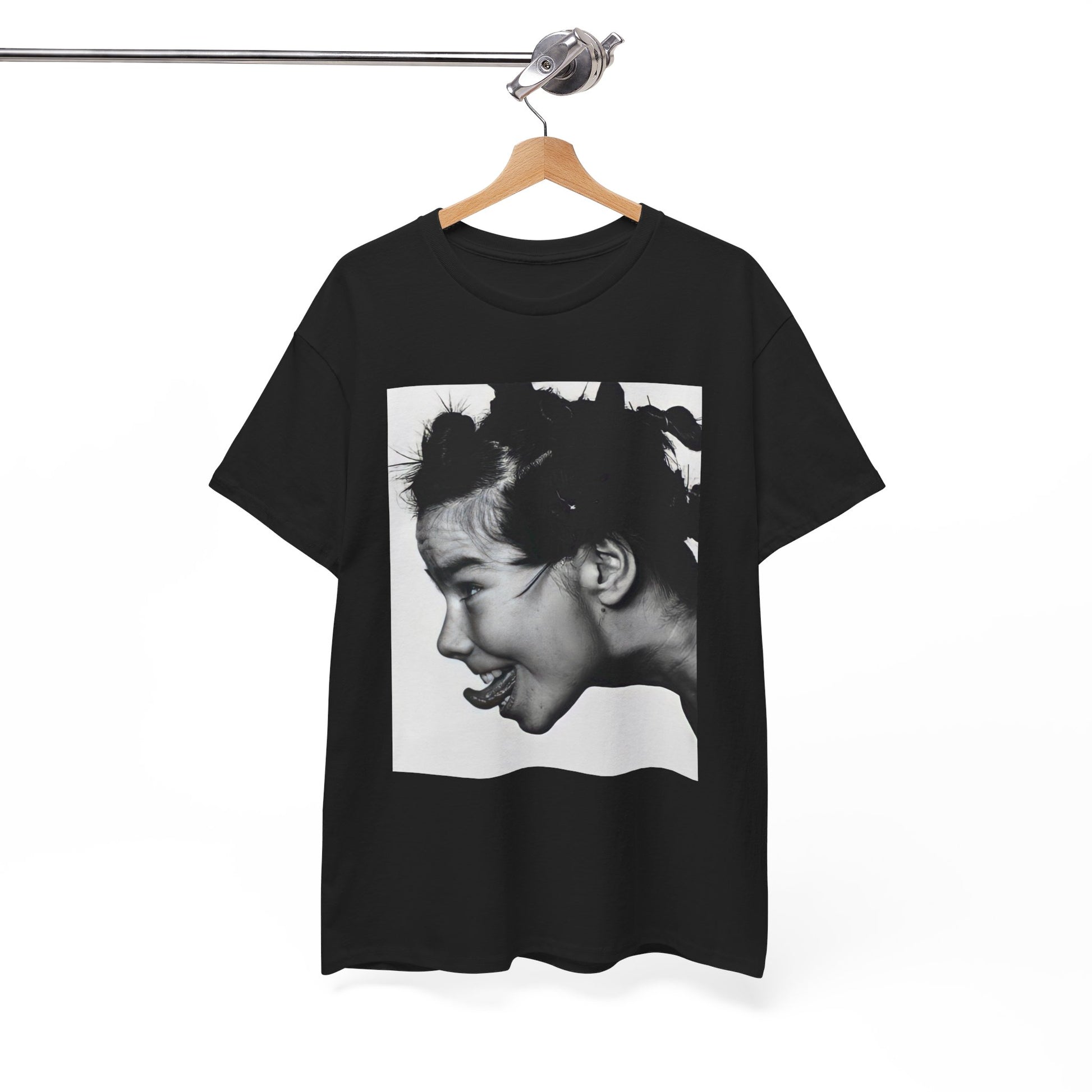 A black graphic t-shirt featuring a graphic of Bjork, designed with an indie 90s aesthetic.