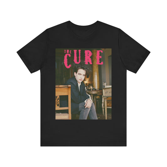 A black graphic t-shirt featuring a retro graphic related to The Cure's 'Disintegration' album era.