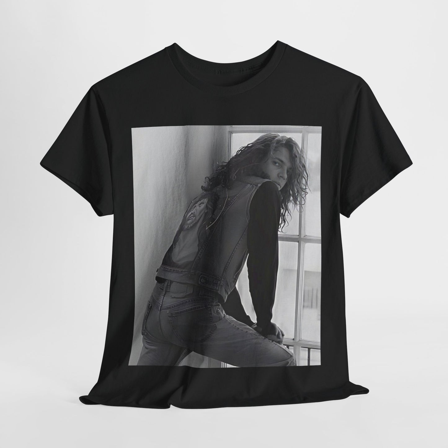 A black graphic t-shirt featuring a 90s black and white photo portrait of Michael Hutchence from INXS.