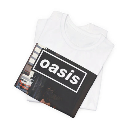 A black graphic t-shirt featuring a classic 90s rock and roll graphic of Oasis.