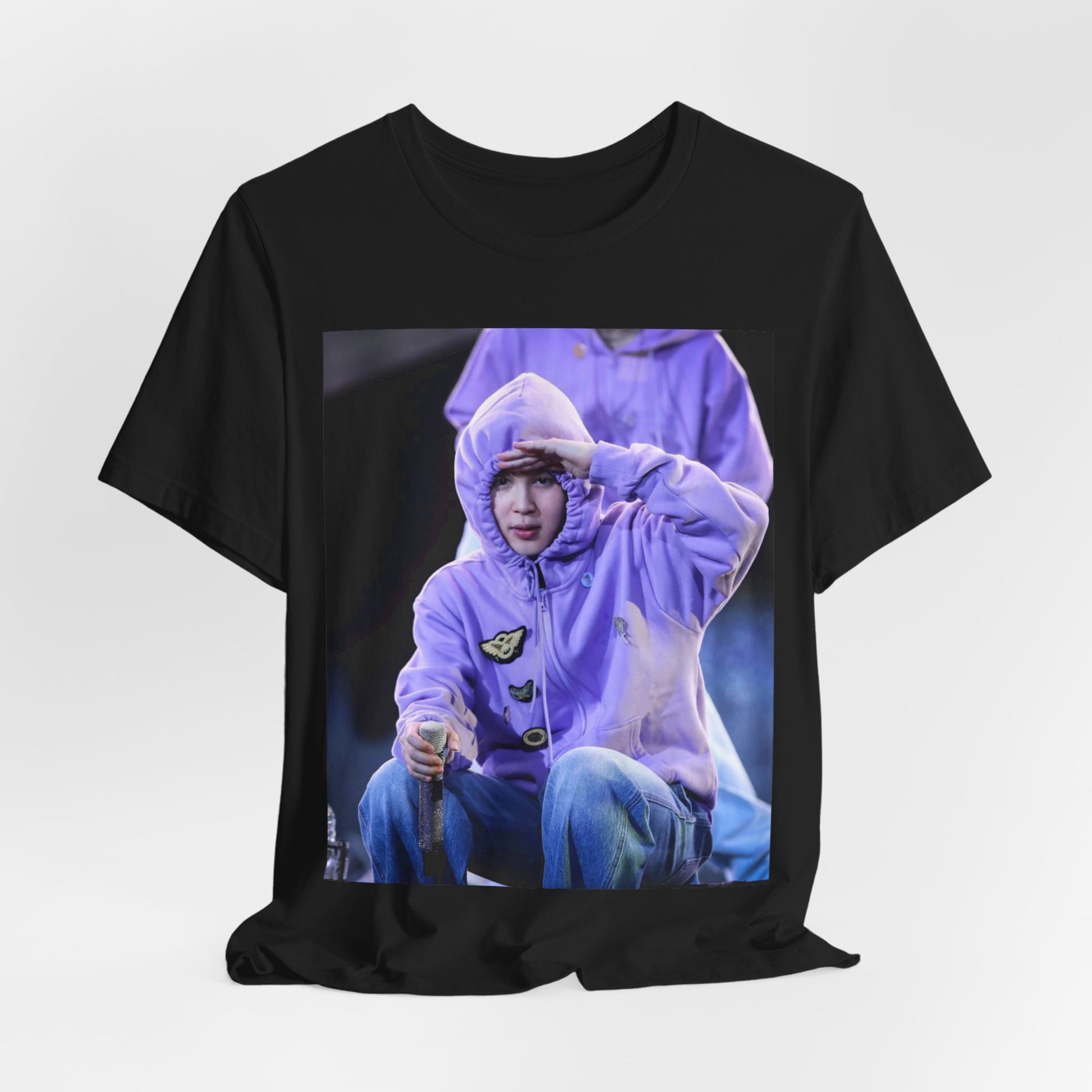 A black graphic t-shirt featuring an authentic live performance graphic of Jimin.