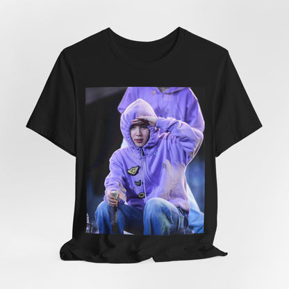 A black graphic t-shirt featuring an authentic live performance graphic of Jimin.