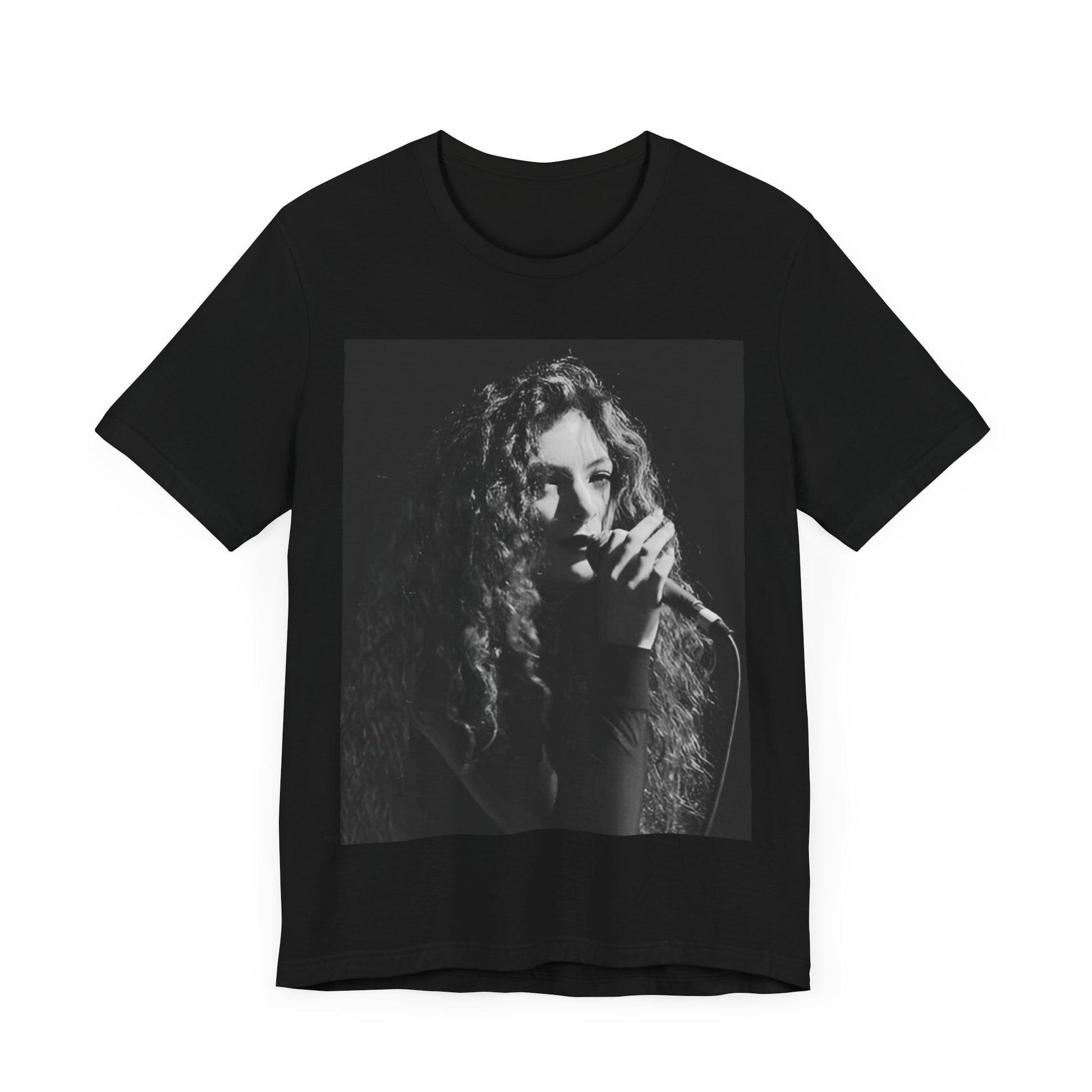 A black graphic t-shirt featuring a graphic or photo of Lorde performing live.