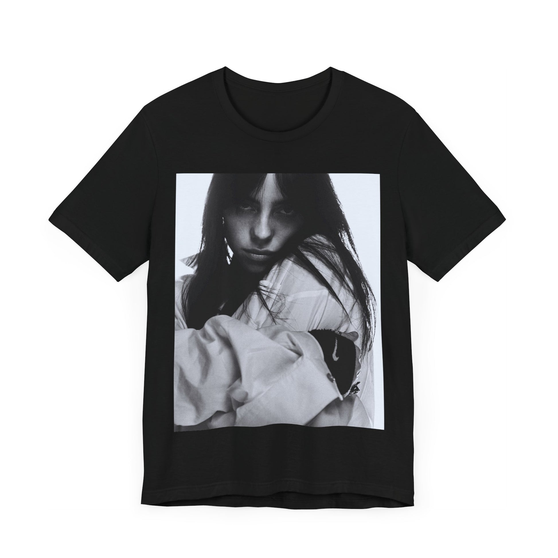 Billie Eilish posing in her signature oversized designer streetwear, printed on a graphic t-shirt.