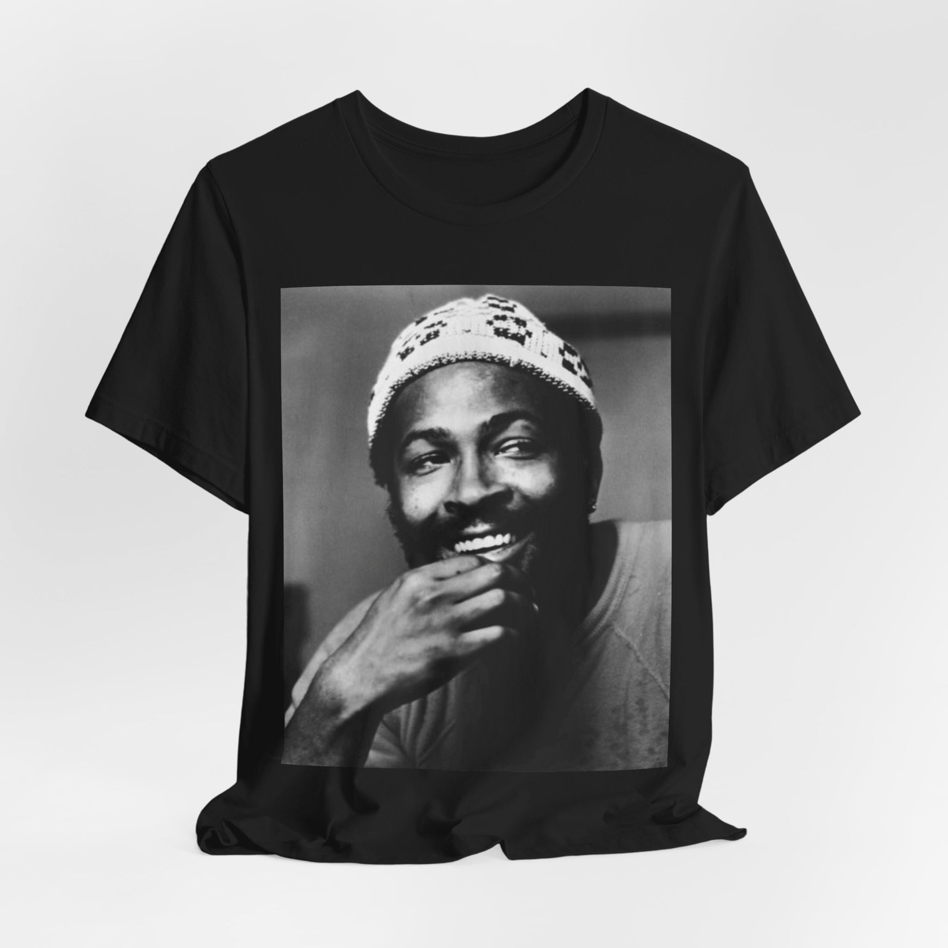 A black graphic t-shirt featuring a 70s retro portrait graphic of Marvin Gaye.