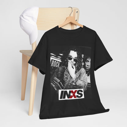 A black graphic t-shirt featuring a black and white, monochrome graphic or photo of INXS.