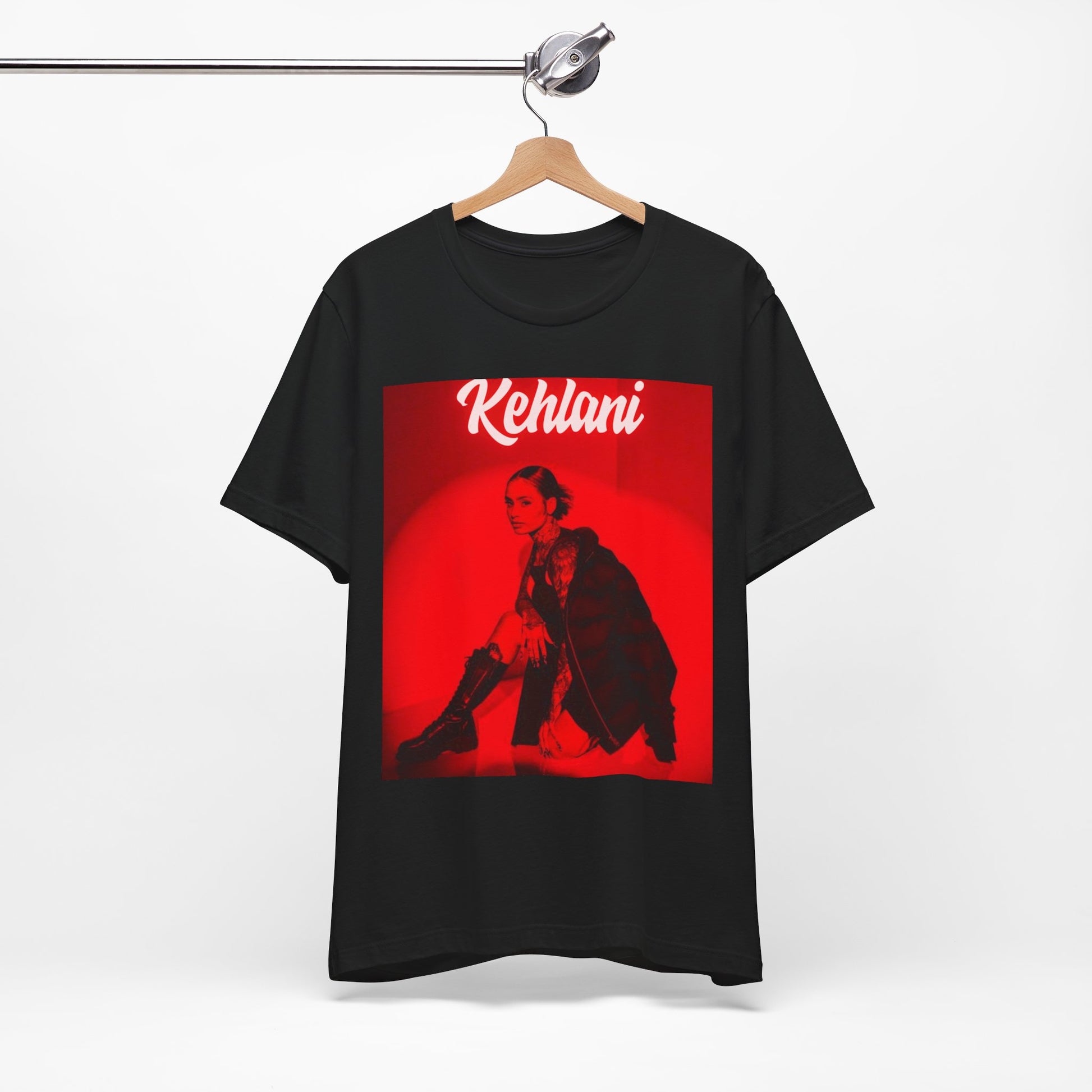 A black graphic t-shirt featuring a photo of Kehlani with a prominent red aesthetic or red lighting.