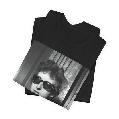 A black graphic t-shirt featuring a graphic related to Bob Dylan's 'The Freewheelin' album era.