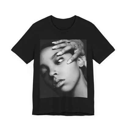 A black graphic t-shirt featuring a black and white, monochrome graphic or photo of Tinashe.