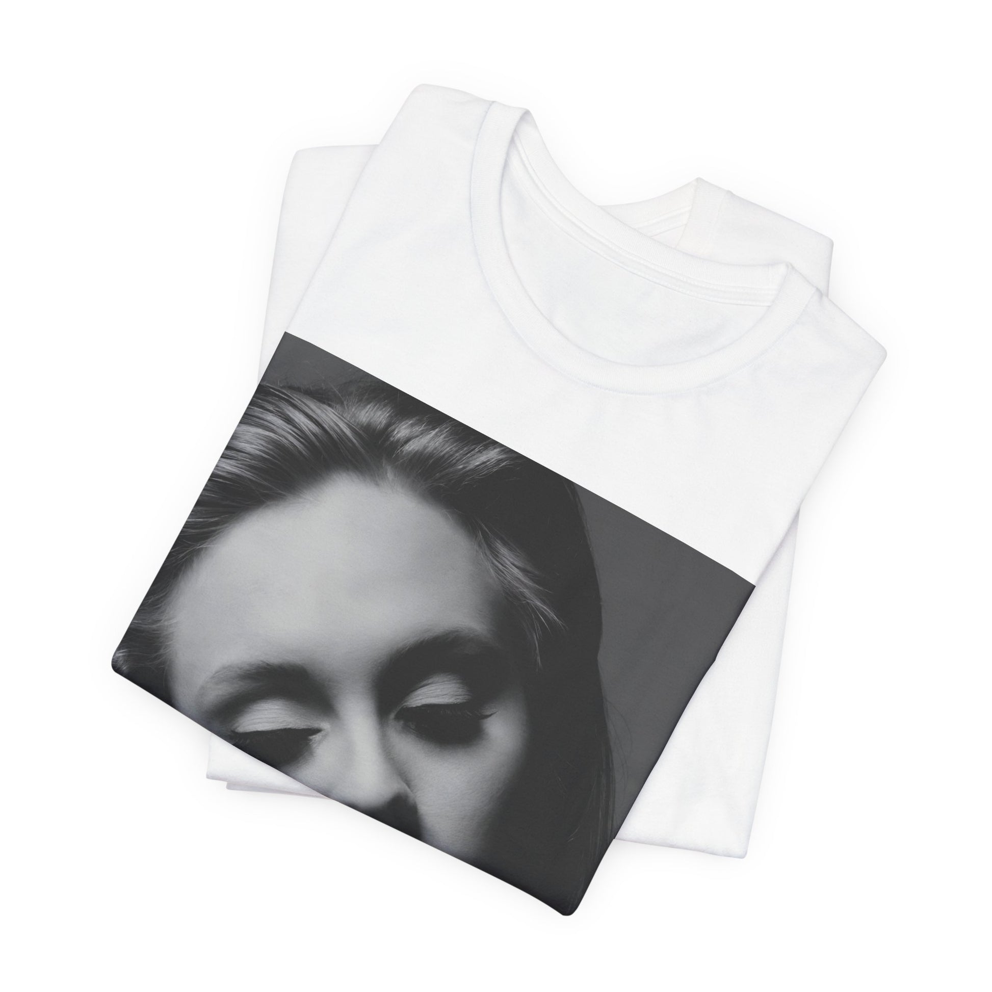 A black graphic t-shirt featuring the album cover art for Adele's '21' album, showing a close-up portrait of her with a contemplative expression.