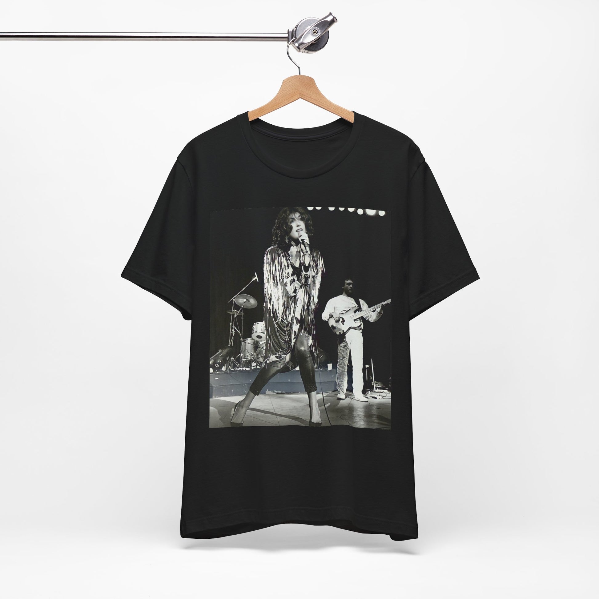 A black graphic t-shirt featuring an 80s black and white photo or graphic of Laura Branigan performing live on stage.