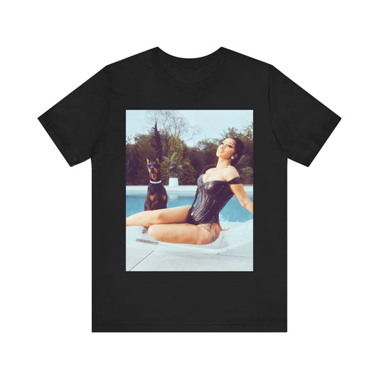 A black graphic t-shirt featuring a graphic related to Cardi B's 'I Like It' song, with bold pop culture elements.