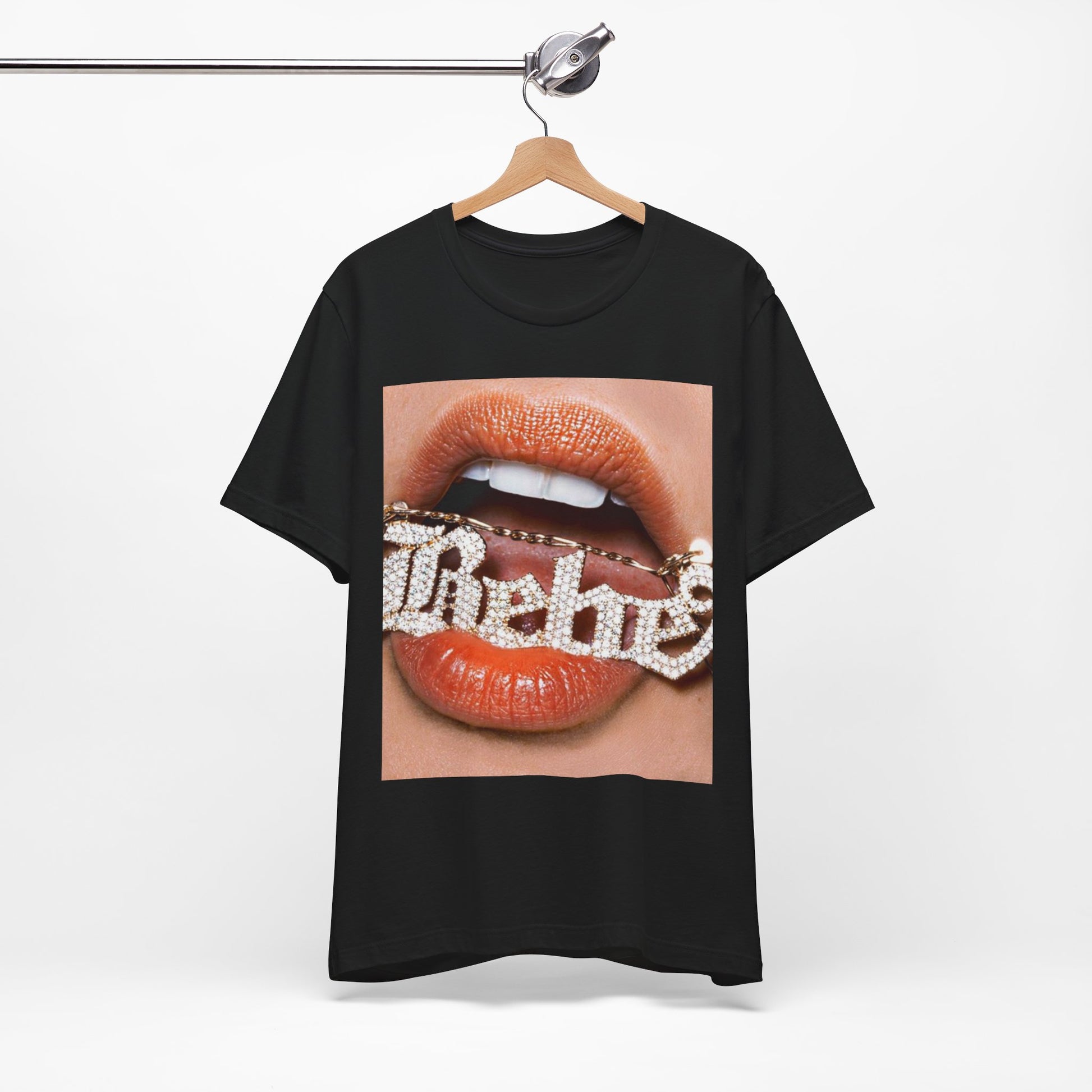A black graphic t-shirt featuring a retro-style graphic inspired by Bebe Rexha's album art.