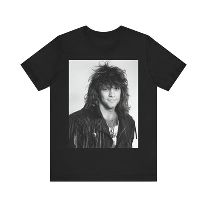 A black graphic t-shirt featuring a black and white photo of Bon Jovi from a 90s tour, performing on stage.