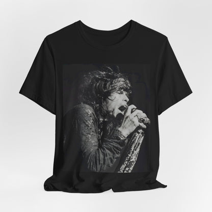 A black graphic t-shirt featuring a retro 70s-style illustration or photo of Aerosmith, designed to evoke their 'On Tour' presence, possibly with band members on stage or tour bus imagery.