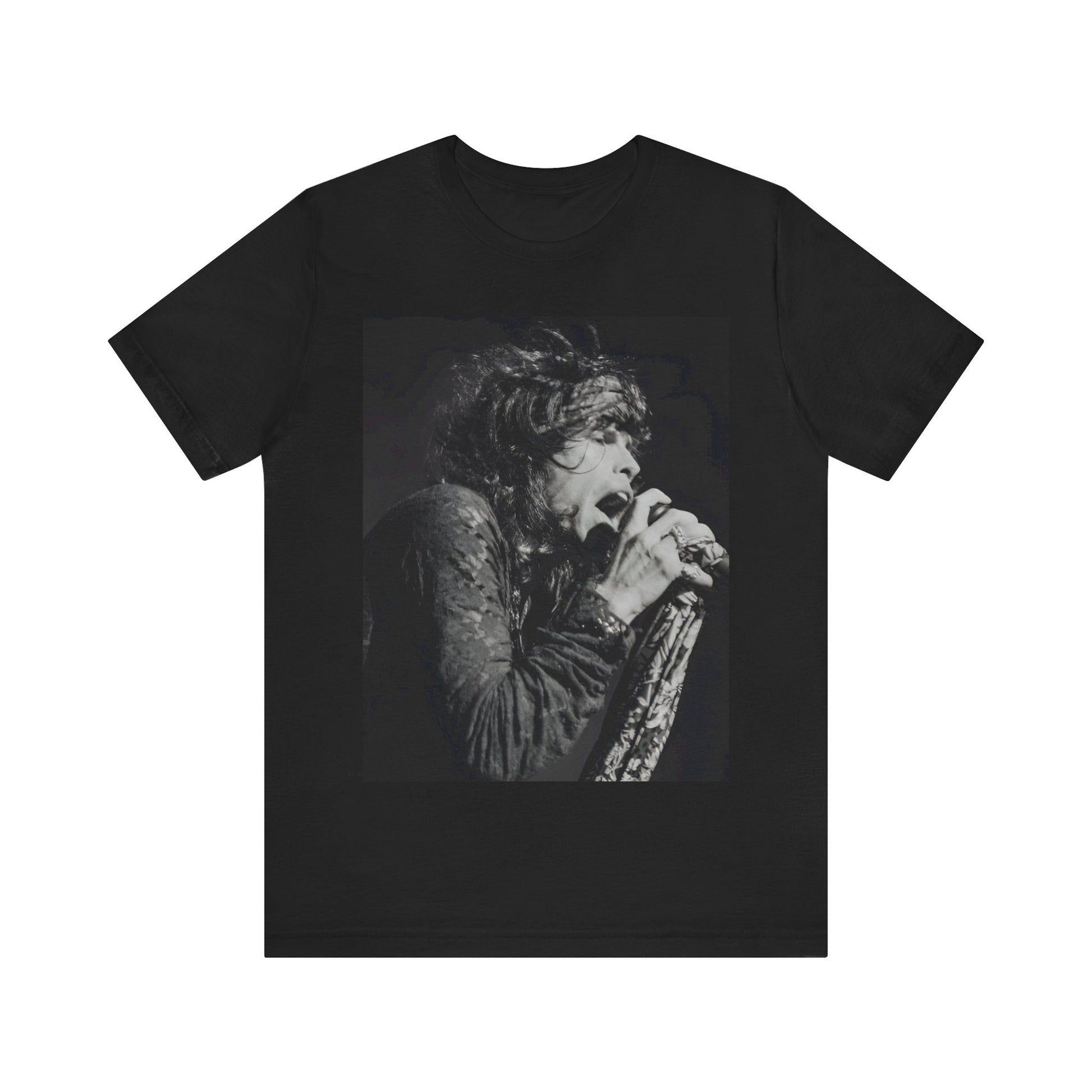 A black graphic t-shirt featuring a retro 70s-style illustration or photo of Aerosmith, designed to evoke their 'On Tour' presence, possibly with band members on stage or tour bus imagery.