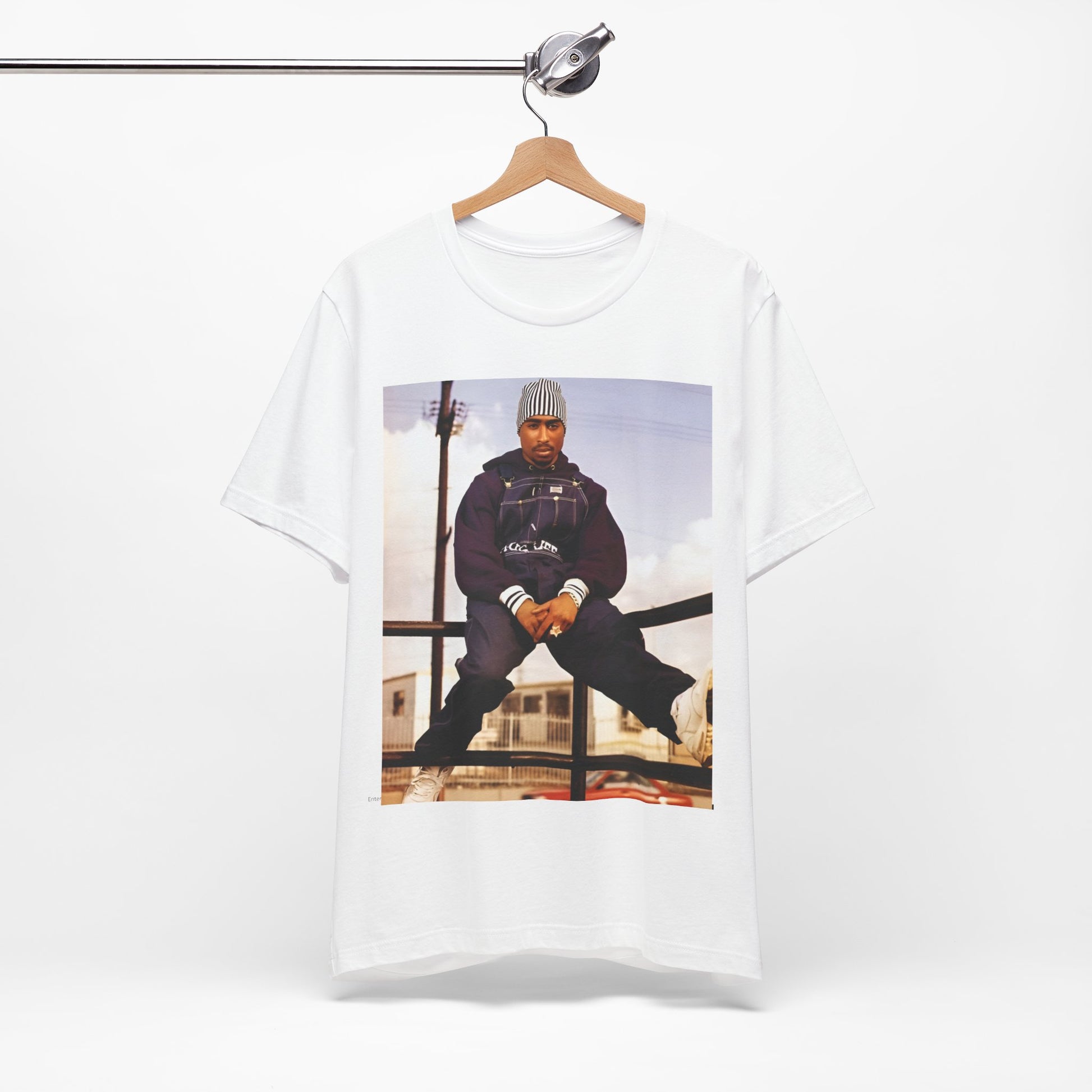 A black graphic t-shirt featuring a timeless rap legend graphic of Tupac.