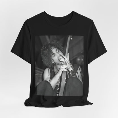 A black graphic t-shirt featuring a graphic or photo of Prince performing wildly on stage.