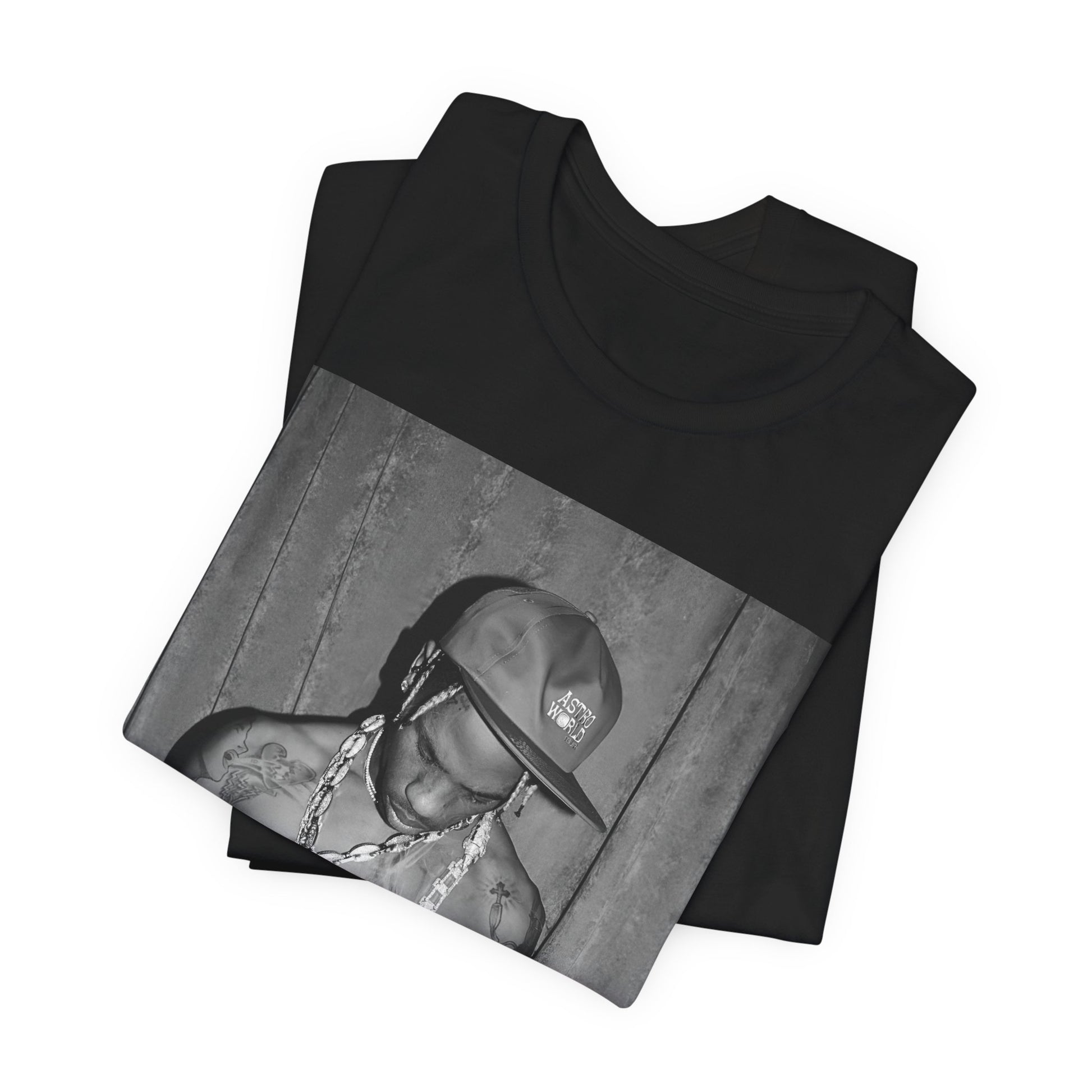 A black graphic t-shirt featuring a graphic of Travis Scott as the Houston rap king.