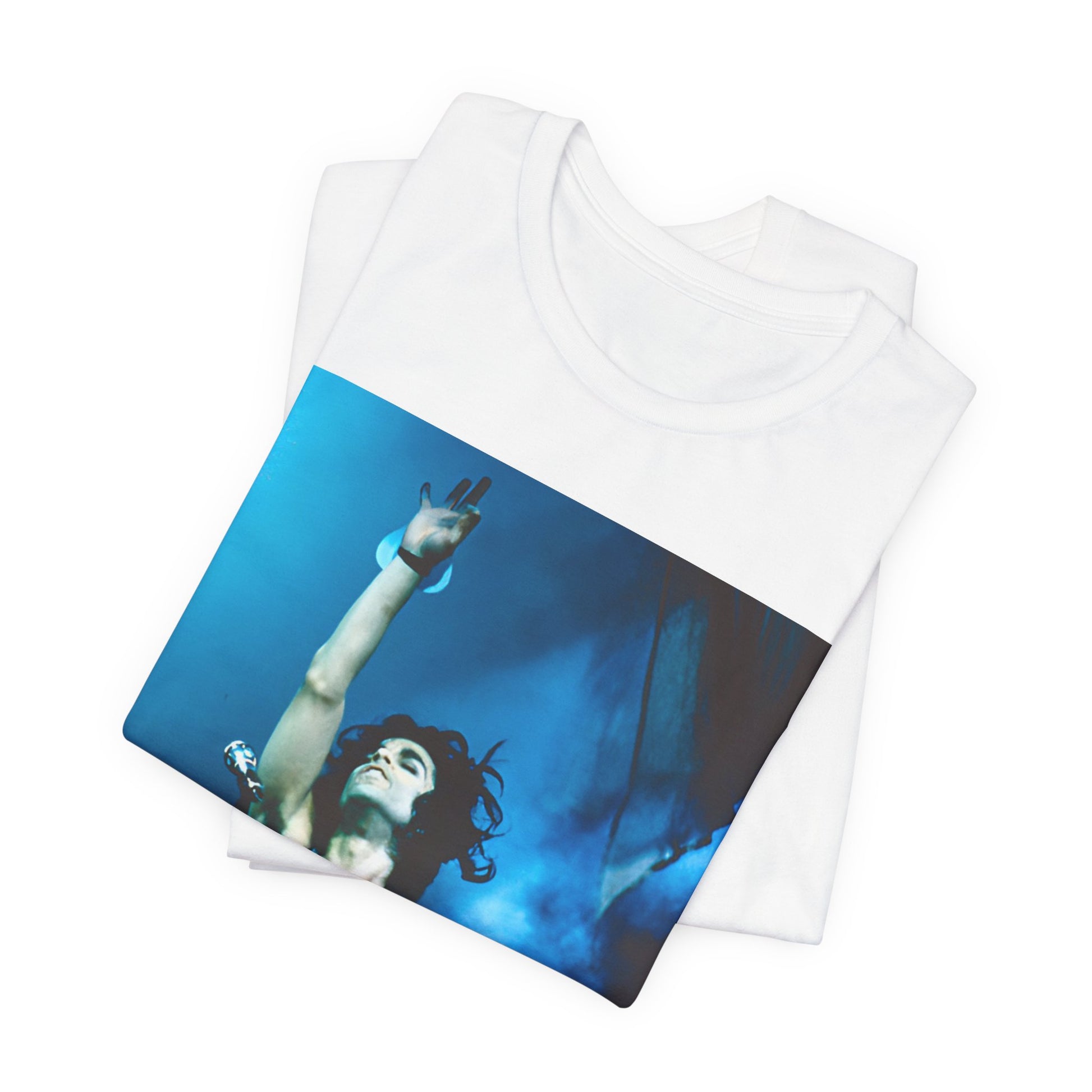 A black graphic t-shirt featuring a graphic of Prince as a guitar god and virtuoso performer.