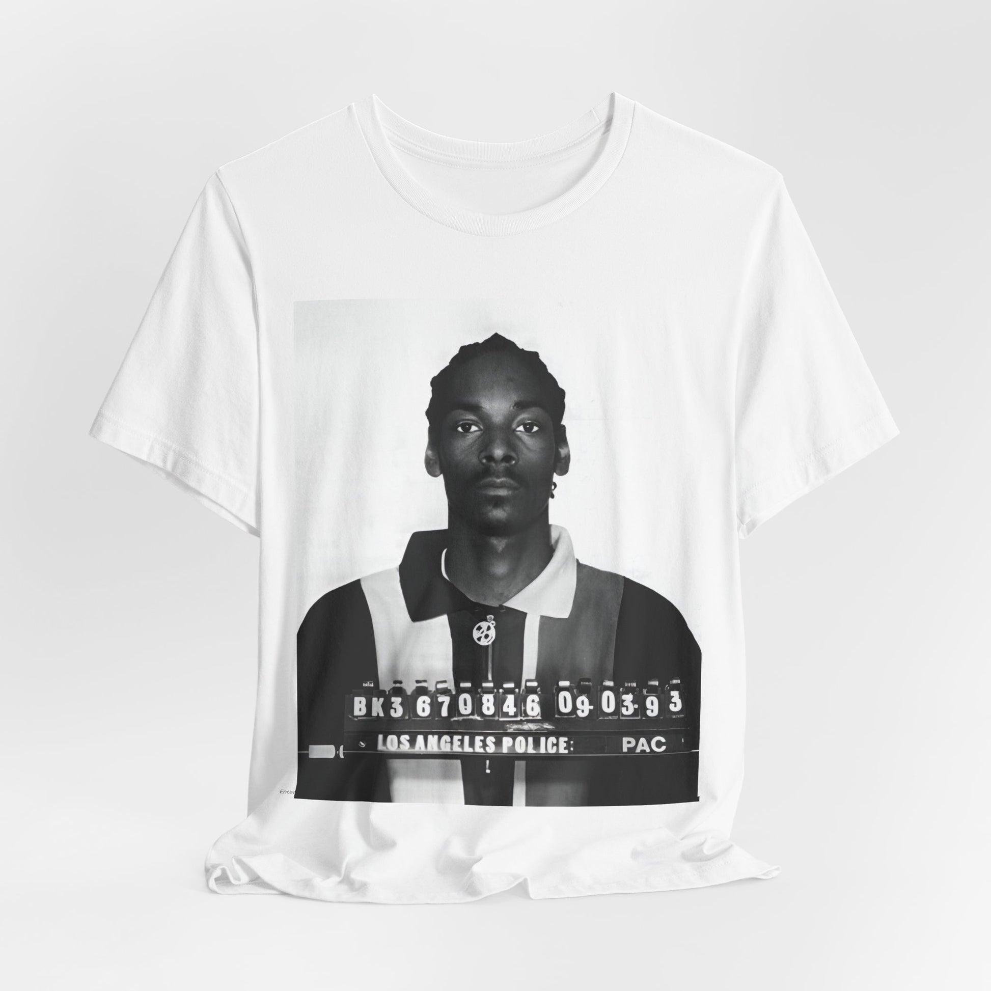 A black graphic t-shirt featuring a graphic of Snoop Dogg's mug shot.