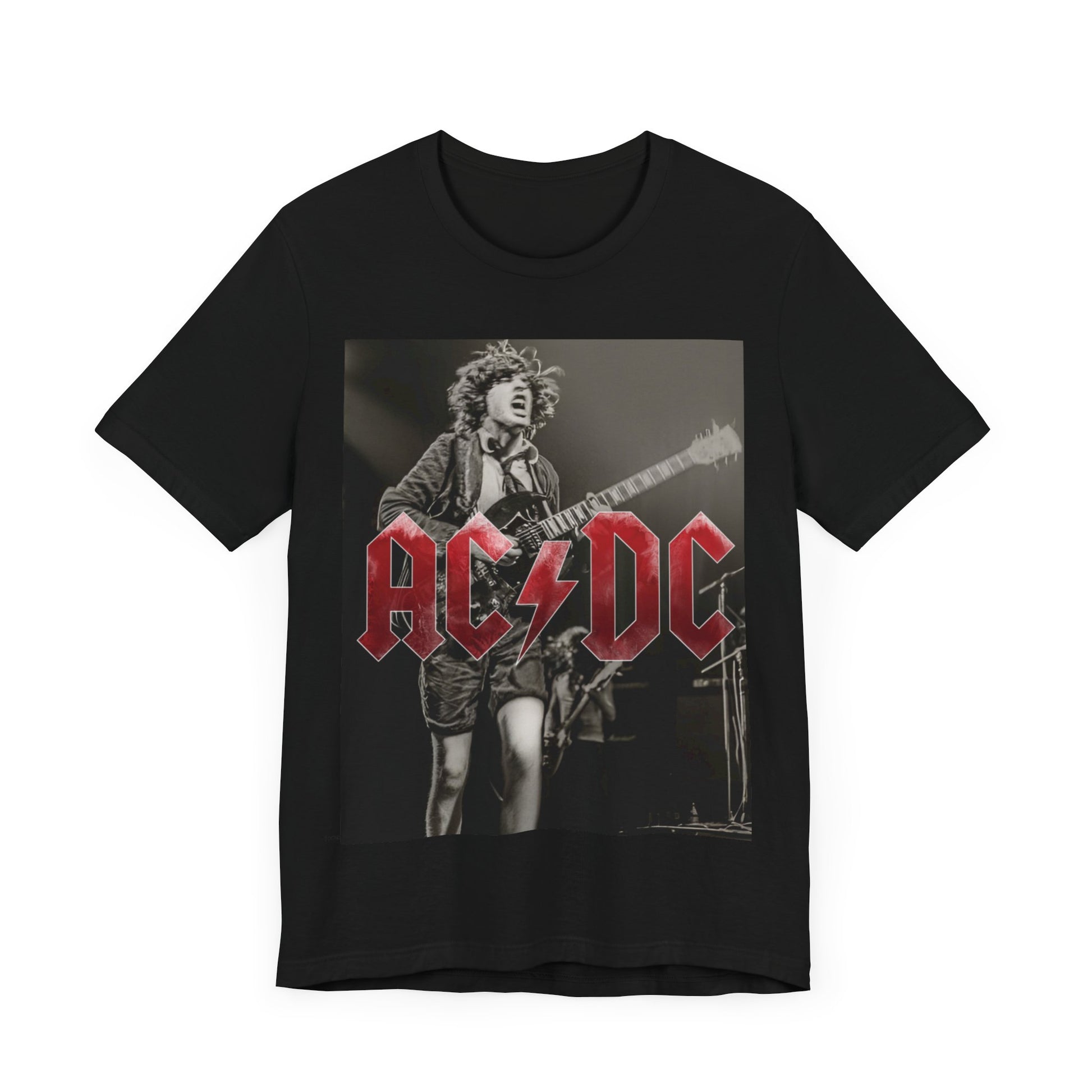 A black graphic t-shirt featuring the AC/DC logo with a dynamic image of Angus Young playing guitar, evoking the phrase 'Feel the Thunder'.