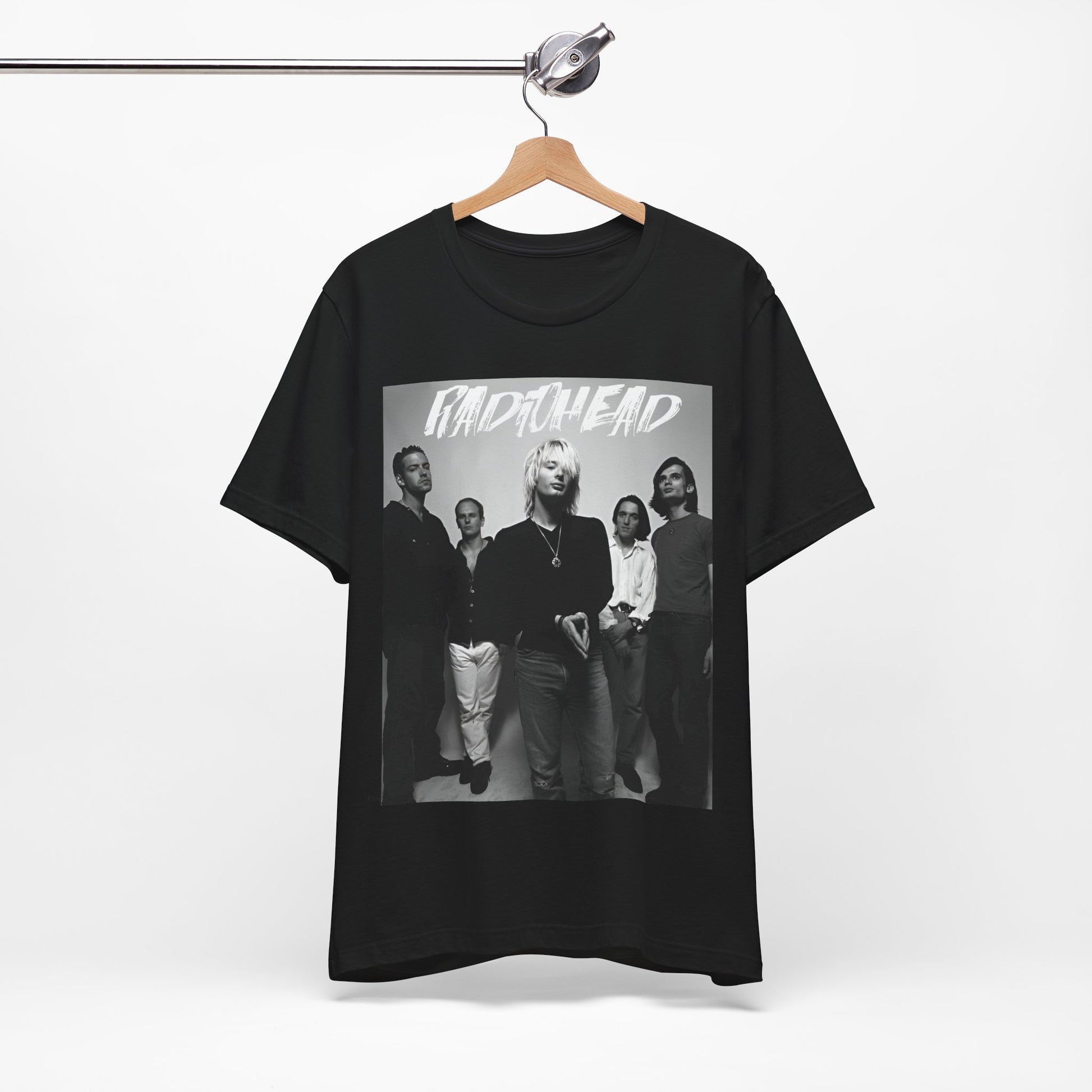 A black graphic t-shirt featuring a retro graphic related to Radiohead's 'OK Computer' album era.