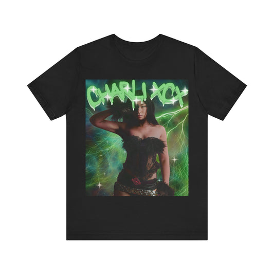 A black graphic t-shirt featuring a retro green neon graphic of Charli XCX's signature.