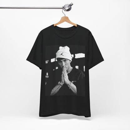 A black graphic t-shirt featuring a black and white portrait photo of Eminem.