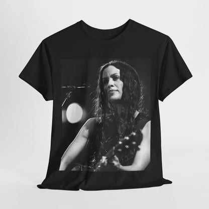 A black graphic t-shirt featuring a 90s-style graphic of Alanis Morissette playing a guitar, with a dynamic expression.