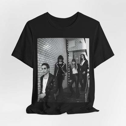 A black graphic t-shirt featuring a black and white graphic or photo of Maneskin in a backstage setting.