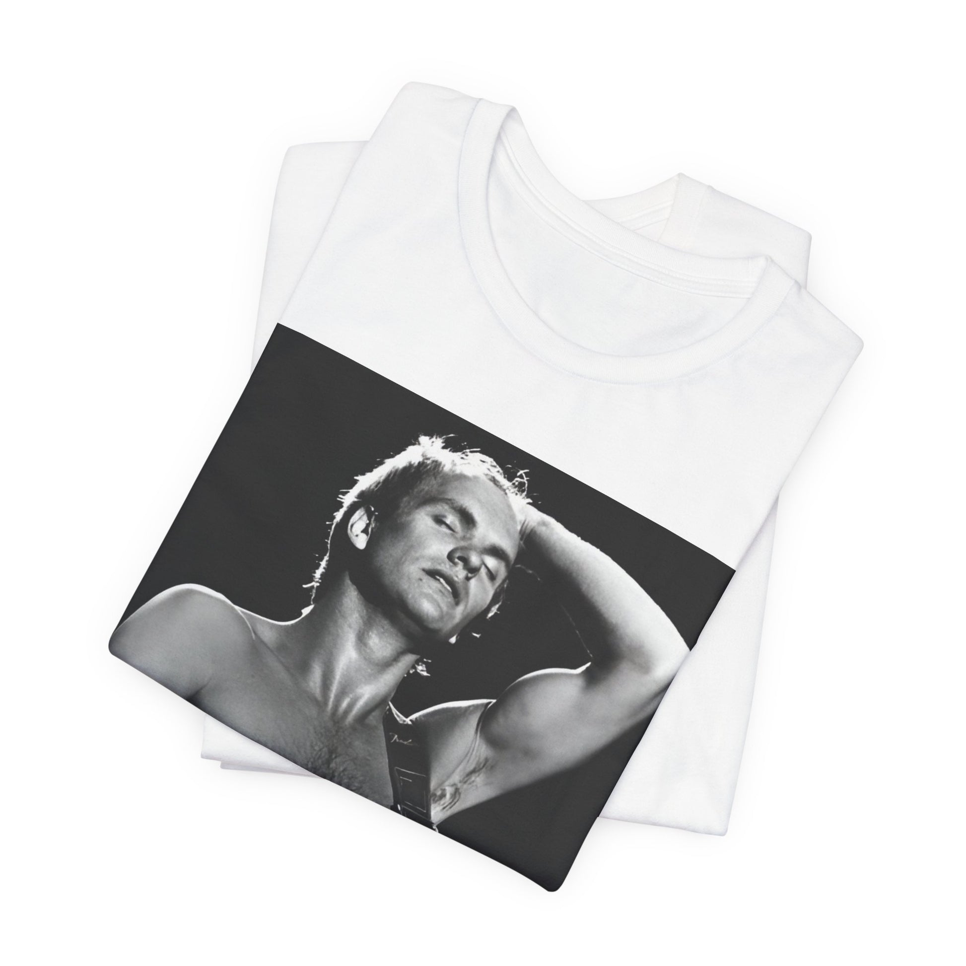 A black graphic t-shirt featuring a graphic or photo of Sting performing live on stage in 1983.