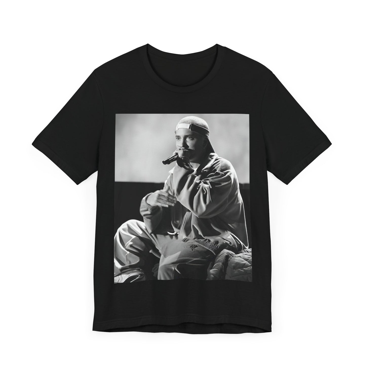A black graphic t-shirt featuring a black and white graphic of Eminem as a 'Rap Messiah'.