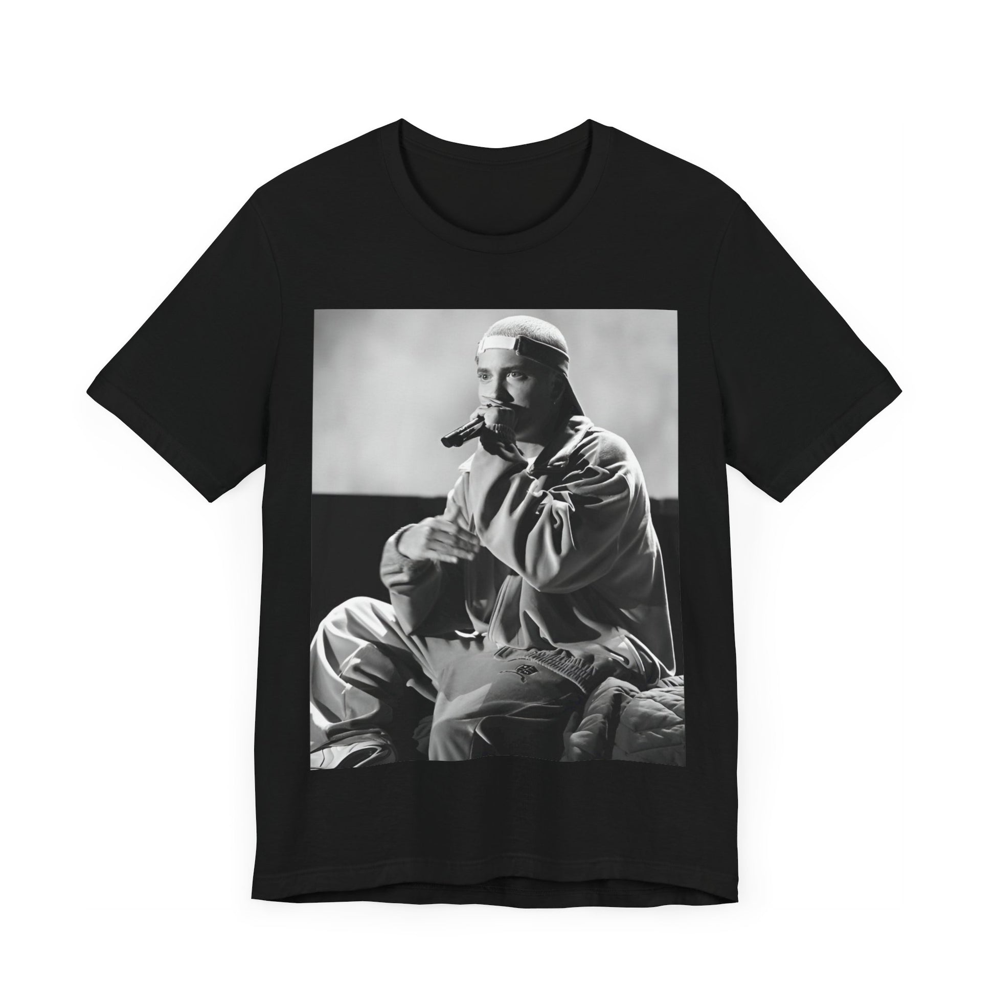 A black graphic t-shirt featuring a black and white graphic of Eminem as a 'Rap Messiah'.