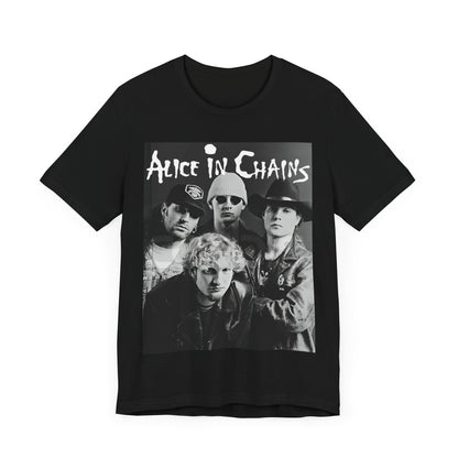 A black graphic t-shirt featuring a black and white photographic portrait of the band Alice In Chains, capturing their iconic grunge look.