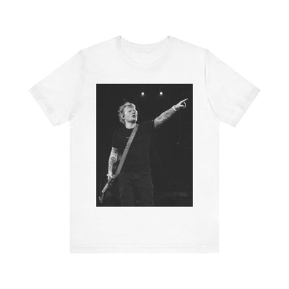 A black graphic t-shirt featuring a black and white graphic or photo of Ed Sheeran performing live on stage.
