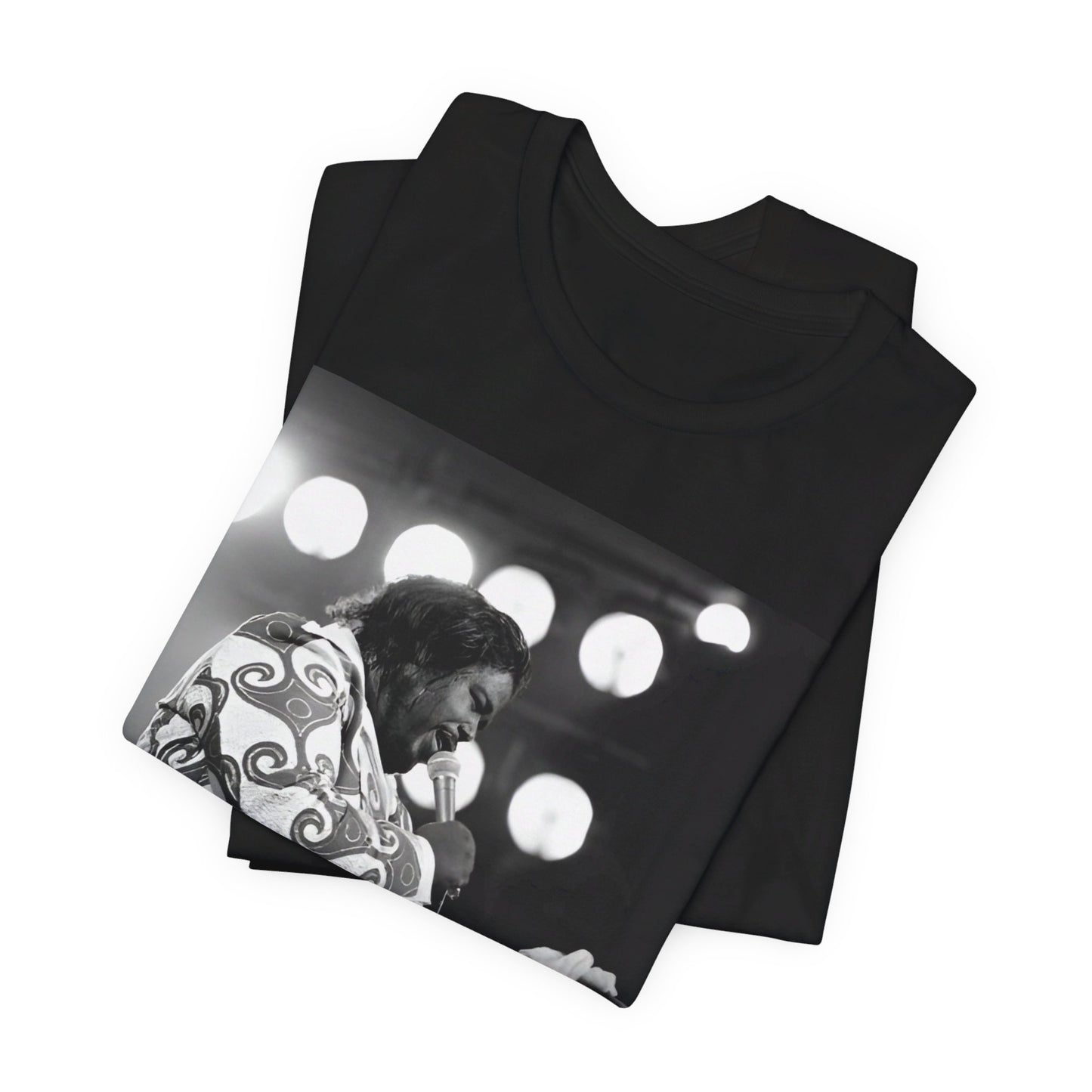 A black graphic t-shirt featuring a graphic or photo of Barry White performing live on stage in the 1970s.