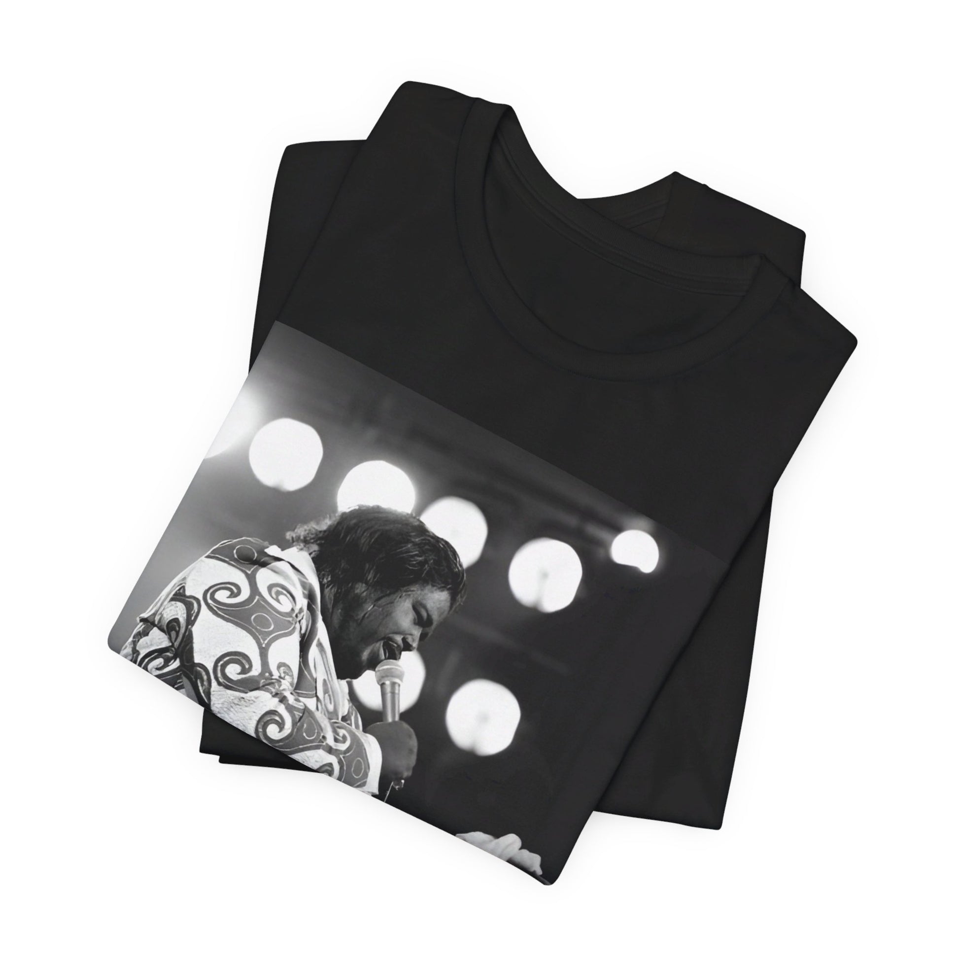 A black graphic t-shirt featuring a graphic or photo of Barry White performing live on stage in the 1970s.