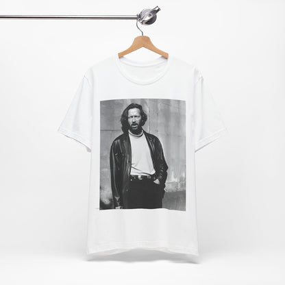 A black graphic t-shirt featuring a retro graphic related to Eric Clapton's 'Cocaine' song or era.