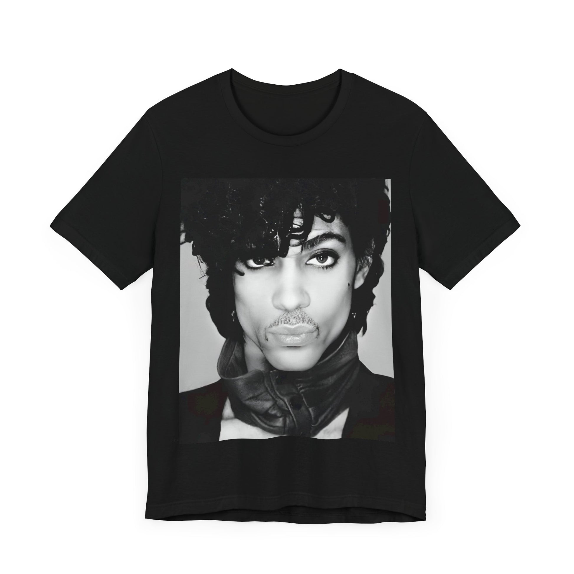 A black graphic t-shirt featuring a black and white photo portrait of Prince.