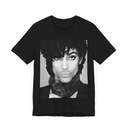 A black graphic t-shirt featuring a black and white photo portrait of Prince.